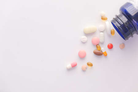 Close up of many colorful pills and capsulesの写真素材