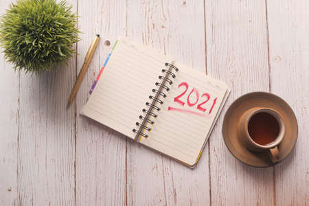 top view of new year goals text on notepad.の写真素材