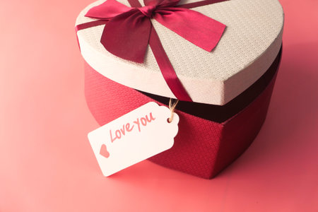 heart shape gift box on pink background