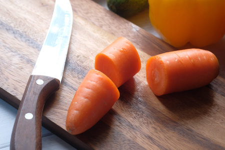 slice of carrot on chopping boardの写真素材
