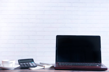 laptop with blank screen on office desk.の写真素材
