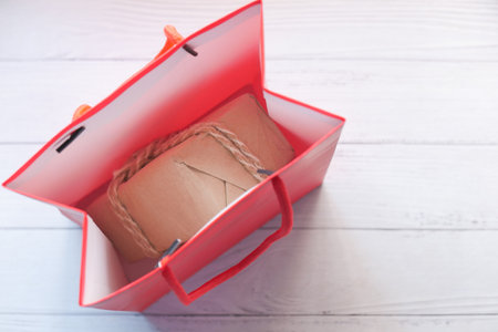 top view of open heart shape gift box on white backgroundの写真素材