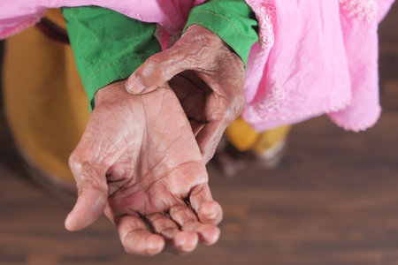 top view of senior women suffering pain in hand close upの写真素材
