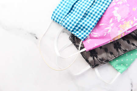 homemade face masks on tiles background top downの写真素材