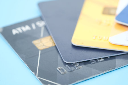 close up of credit cards on wooden background