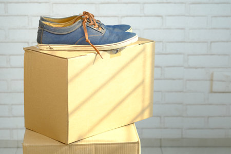 new shoe on a card board box with copy spaceの写真素材