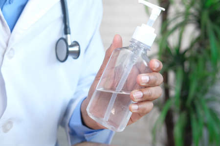 close up of doctor hand using sanitizer gelの写真素材