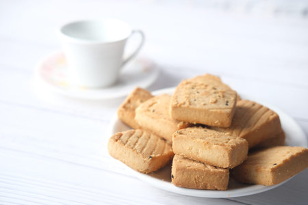 Close up of cookies and tea on table