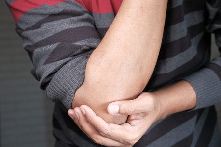 man with elbow pain, Pain relief concept.