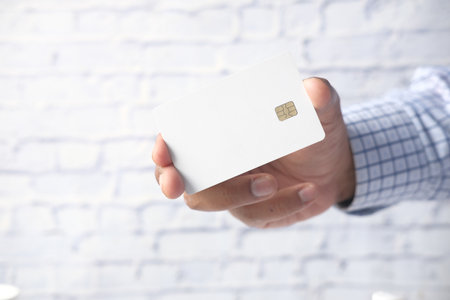 hand holding credit cards reading informationの写真素材