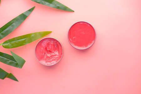 top view of pink color petroleum jelly in a containerの写真素材