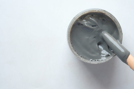 bubble clay mask in container on white background