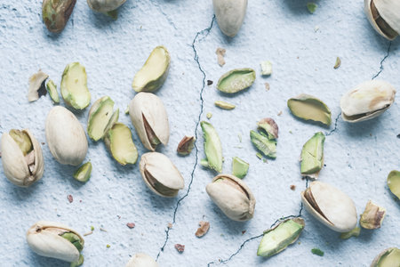 pistachios nut spilling on table top viewの写真素材