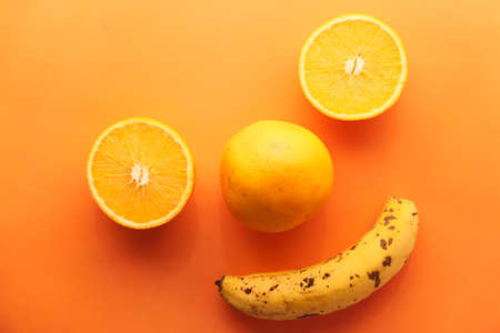close up of slice of orange fruit in a bowl .の写真素材