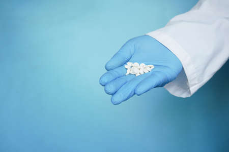 white color medical pills on handの写真素材