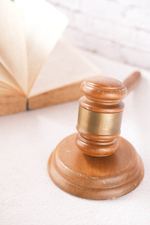 gavel and book with copy space on tableの写真素材