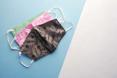 cloth face masks on color background top downの写真素材