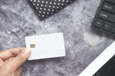 close up of person hand holding credit cardの写真素材