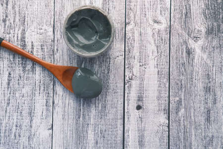 bubble clay mask in container on white backgroundの写真素材