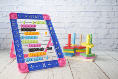 toddler playing with counting math learning toy .の写真素材