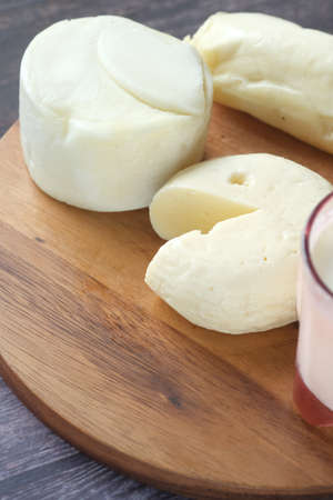 close up of fresh cheese on white background.の写真素材