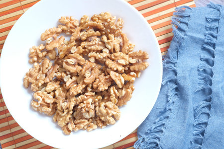 walnut on a plate on table , close up.の写真素材