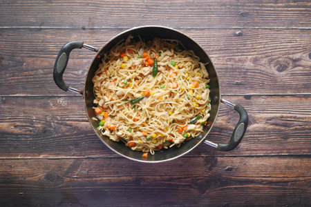 pasta in a pan on black background.の写真素材