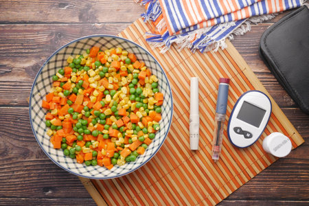 diabetic measurement tools and healthy food on tableの写真素材
