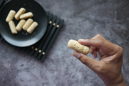 holding Tasty oats bars close up