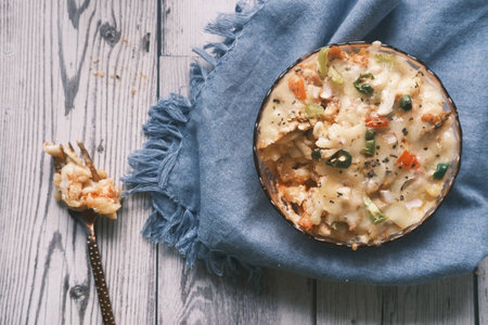 homemade cooked pasta in a plate on table .の写真素材