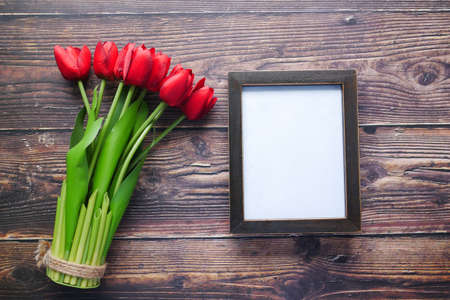 top view of empty frame on black background .の写真素材