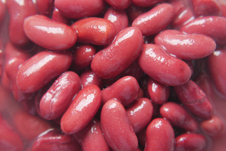 Grains Red bean in a bowl on table .