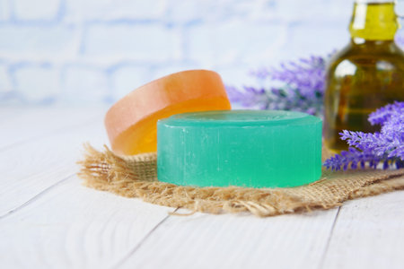 Homemade soap with dried lavender on table with copy spaceの写真素材