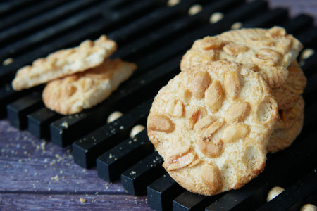 close up of peanut cookies on wooden table
