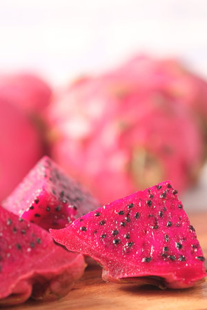 slice of dragon fruit on a chopping board.