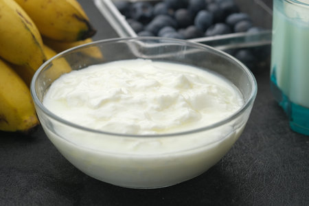 fresh yogurt in a bowl on table