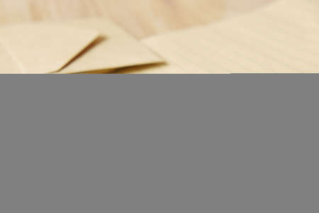 envelope , empty paper and fountain pen on tableの写真素材