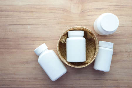 many medical pills container on tableの写真素材