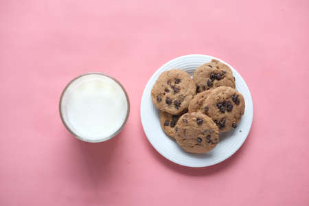 chocolate cooking and a glass of chocolate milkshake on pinkの写真素材