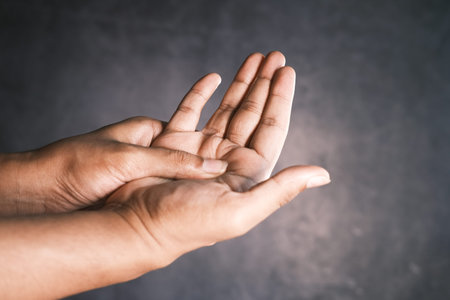 man suffering pain in hand close up