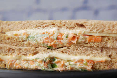 vegetable sandwich on a pate on table .の写真素材