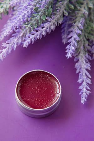 purple color petroleum jelly in a containerの写真素材