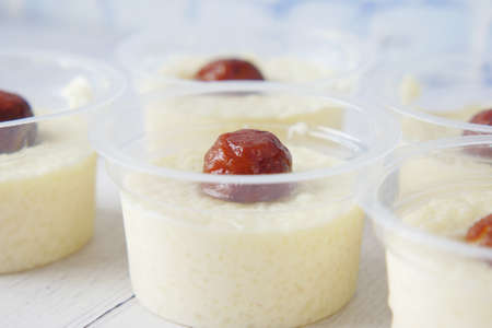 close up of indian sweet in a bowl on table.の写真素材