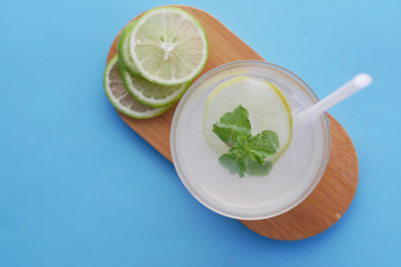 top view of fresh lime juice on tableの写真素材