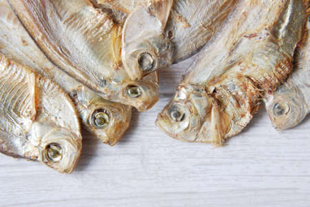 close up of dried fish on blue backgrundの写真素材
