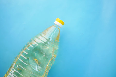 sunflower oil bottle on blue background