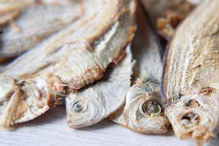 close up of dried fish on blue backgrundの写真素材