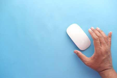Businessman hand with computer mouse, Close up