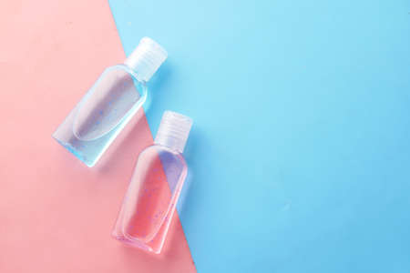 hand sanitizer liquid in a plastic bottle on color backgroundの写真素材