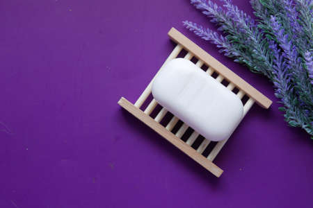 Homemade soap with dried lavender on table with copy spaceの写真素材